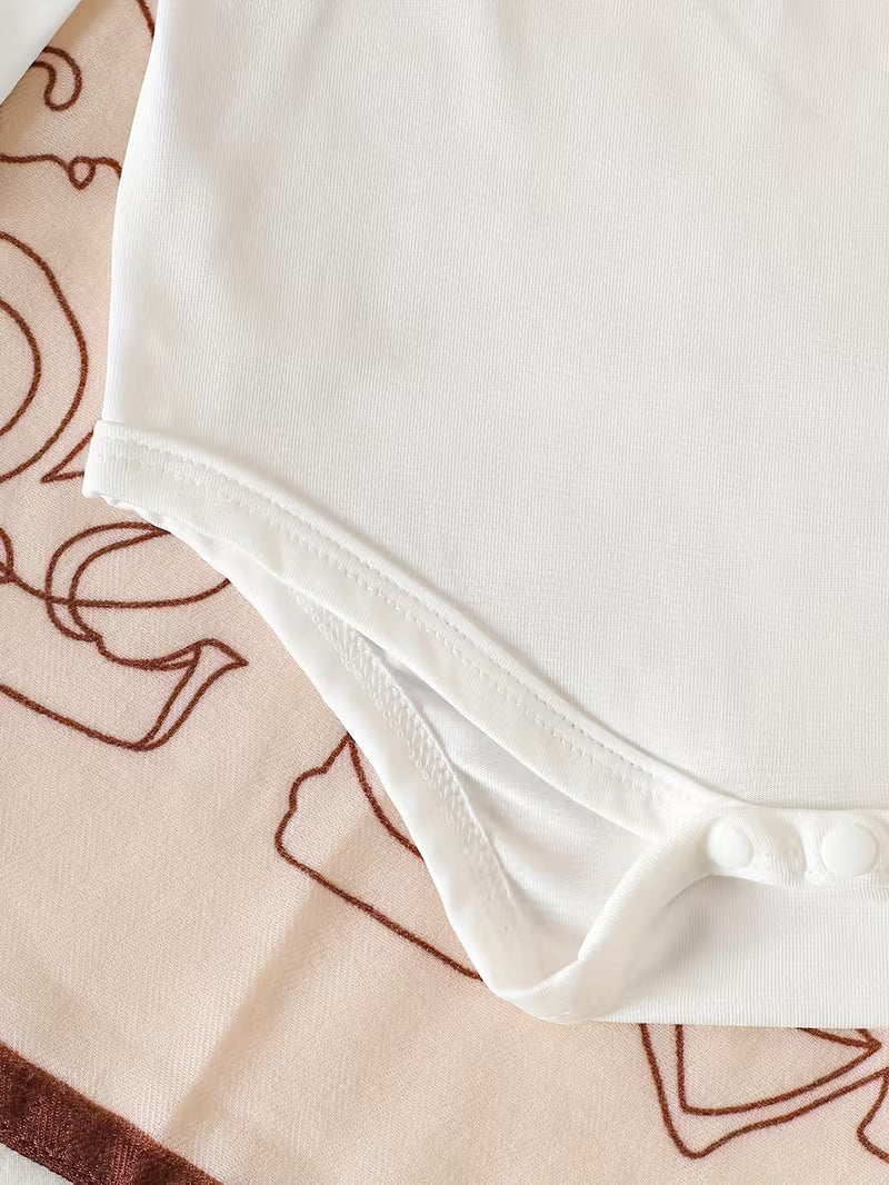 Pure White Long-sleeved Romper with Flutter Sleeves Paired with a Denim Floral Print